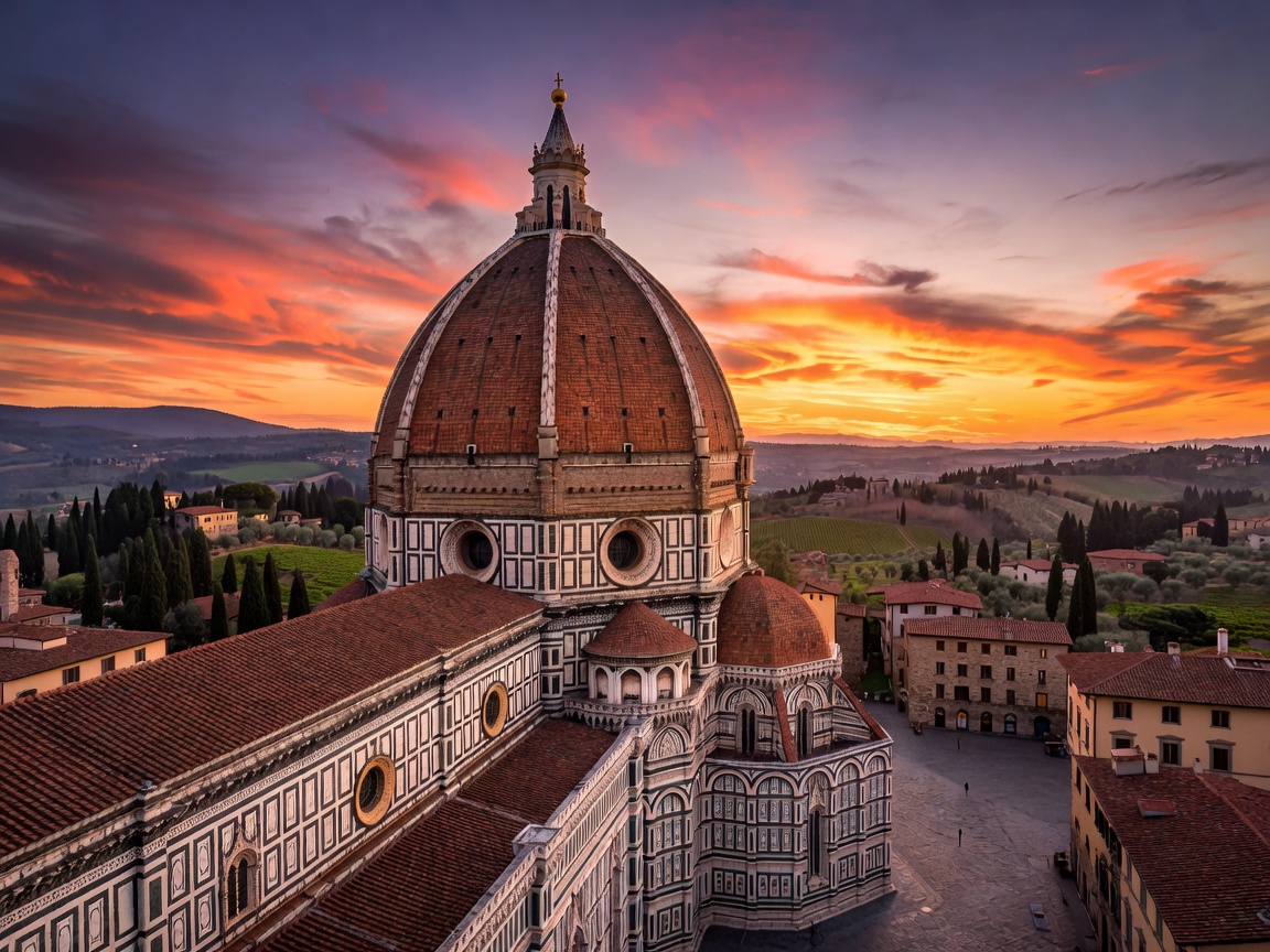 Florence Cathedral Santa Maria del Fiore dome against sunset sky in Tuscany Italy